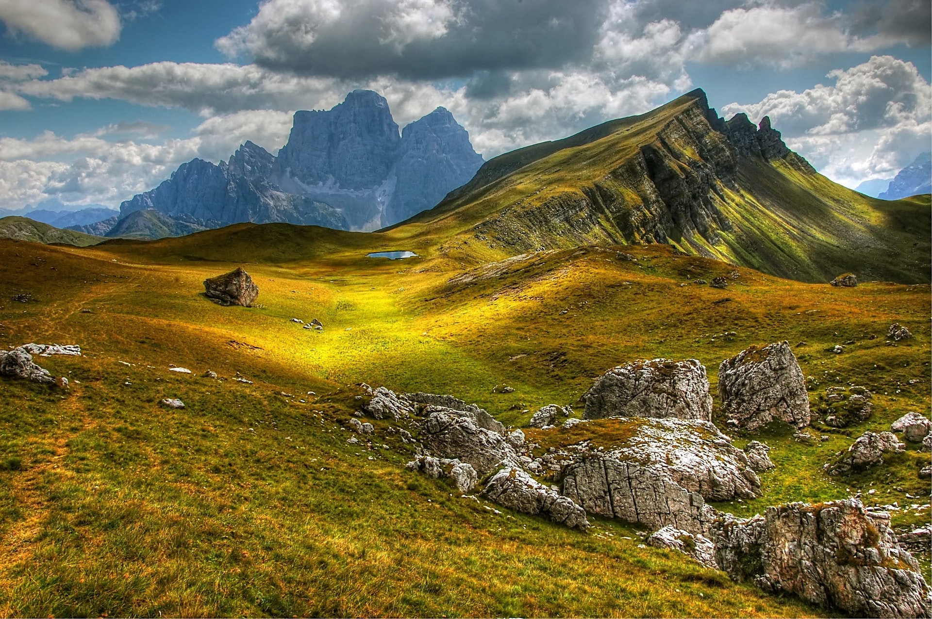 Picture of a mountain with a sunlit spot.